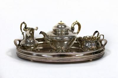 A matched three-piece silver tea set,