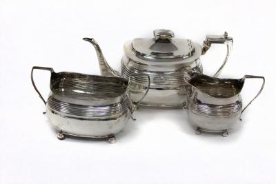 A George III three-piece silver tea
