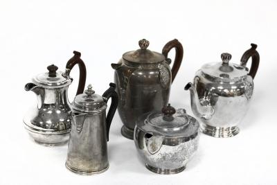 A silver coffee pot and teapot,