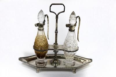 A silver mounted oil and vinegar set,