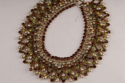 An elaborate costume necklace,