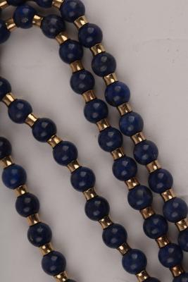 A lapis bead necklace, the circular