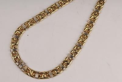 A French gold necklace by Caplain,
