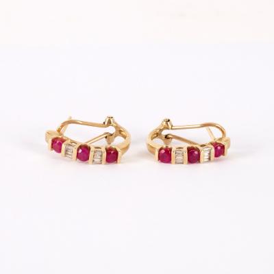 A pair of ruby and diamond half