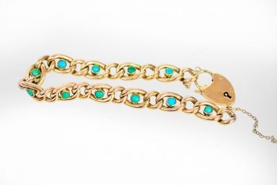 A turquoise and 9ct gold bracelet