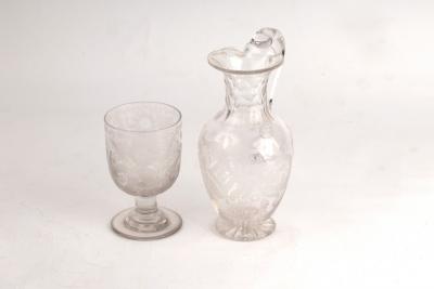 A Victorian engraved glass ewer