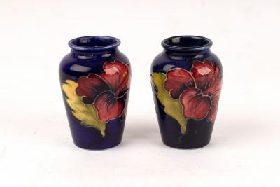 A pair of Moorcroft vases of baluster