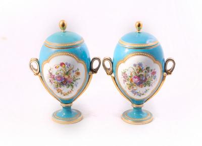 A pair of ovoid porcelain vases and