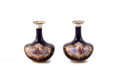 A pair of Royal Crown Derby vases
