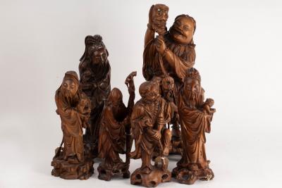 Six Chinese carved root wood figures