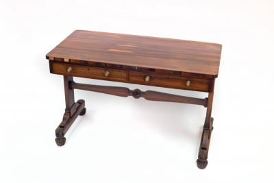 A Regency rosewood library table fitted