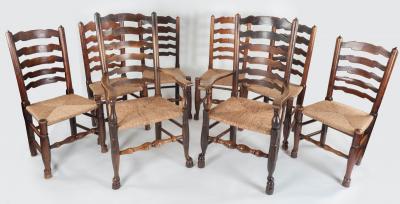 A set of eight ladderback dining