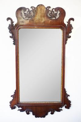 A George III mahogany mirror with a