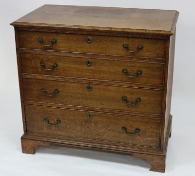 A George III oak chest of four