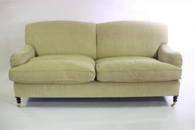 A George Smith two-seater sofa on turned