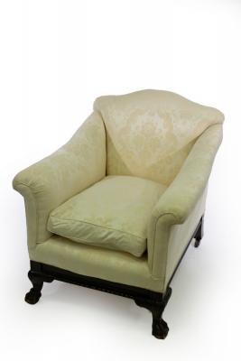 A deep-seated armchair on ball and claw