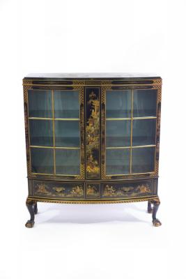 A chinoiserie display cabinet of bowfront