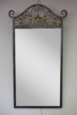 A wrought iron framed mirror, 115cm