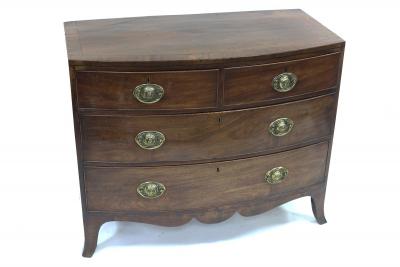 A 19th Century bowfront chest of two