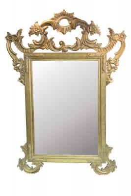 A gilt framed overmantel mirror