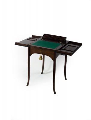 An Edwardian mahogany writing table,