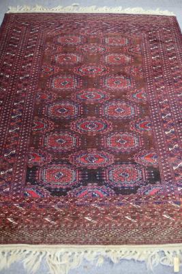 A Bokarah style rug of crimson 2dcaeb