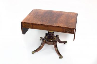 A Regency rosewood and brass inlaid