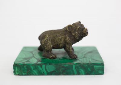 A bronze figure of a bear on a