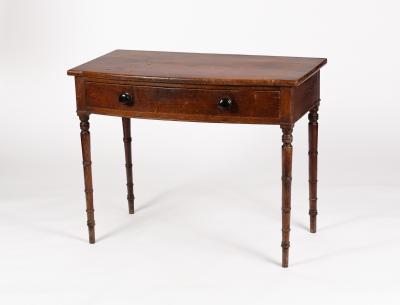 A George IV bowfront side table