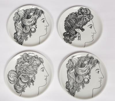 A set of four Fornasetti Milano Le Bellezze