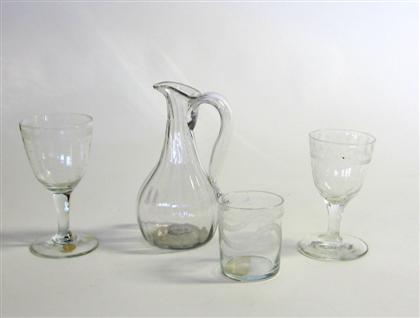 Group of four uncolored glass table