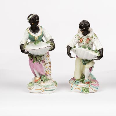 Two Derby blackamoor sweetmeat figures,