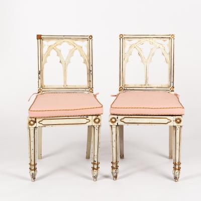 A pair of Regency white and gilt