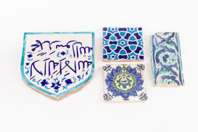 Four Persian pottery glazed tiles, various