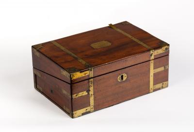 A brass bound work box with fitted