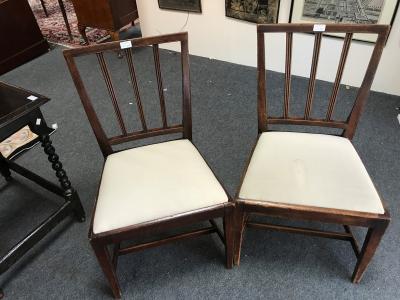 A pair of fruitwood single chairs