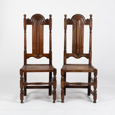 A pair of oak single chairs with