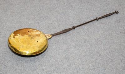 A Charles II brass warming pan,