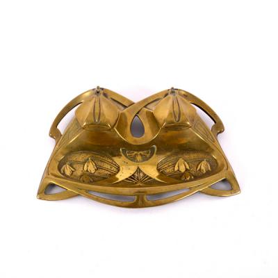 A brass inkwell in the Jugendstil