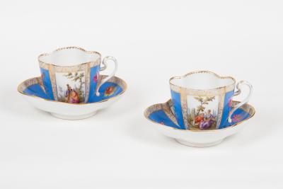 A pair of Dresden cabinet cups and saucers,