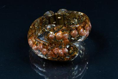 A vintage lucite hinged bangle