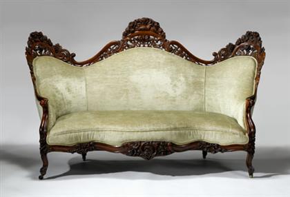     	Rococo-revival carved rosewood