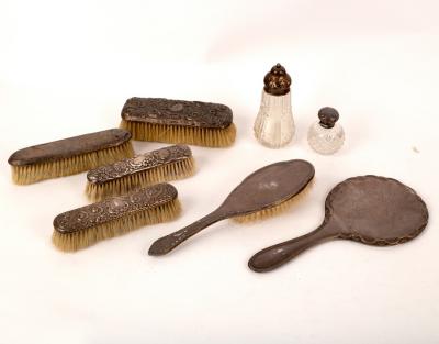 Four silver backed clothes brushes,