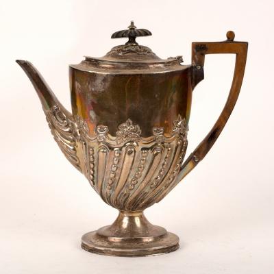 A Victorian silver coffee pot,