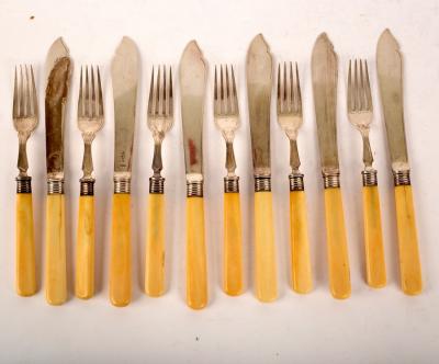A set of six silver fish knives