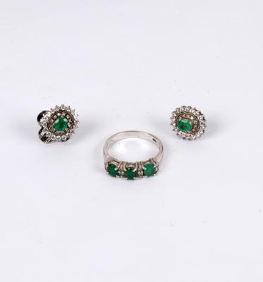 An emerald and diamond ring, the