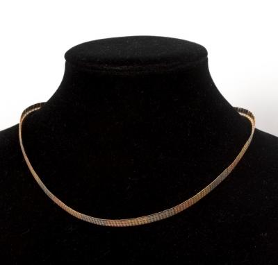 An 18ct tri-colour gold necklace