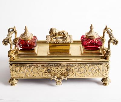 An engraved brass inkstand and