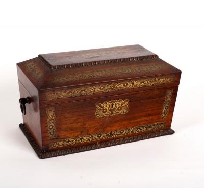 A Regency rosewood tea caddy of 2dd2b0