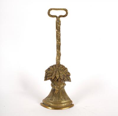 A brass door porter in the form